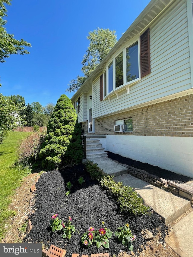 99 Exeter Ct, Shepherdstown, WV 25443 - view of side of home featuring brick siding and cooling unit