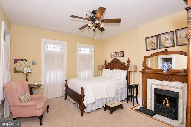 301 Meyers Ave, Meyersdale, PA 15552 - carpeted bedroom featuring ceiling fan and a tile fireplace