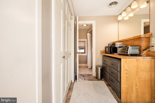 301 Meyers Ave, Meyersdale, PA 15552 - bathroom featuring vanity, stone finish flooring, and baseboards