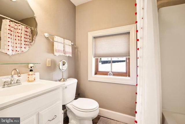 301 Meyers Ave, Meyersdale, PA 15552 - bathroom featuring toilet, vanity, a shower with shower curtain, and baseboards