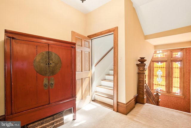 301 Meyers Ave, Meyersdale, PA 15552 - entryway featuring carpet, stairway, baseboards, and lofted ceiling