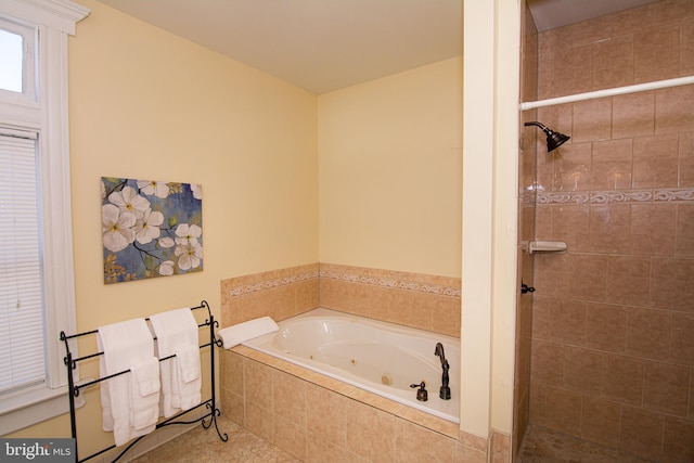 301 Meyers Ave, Meyersdale, PA 15552 - bathroom featuring a stall shower, a jetted tub, and tile patterned floors