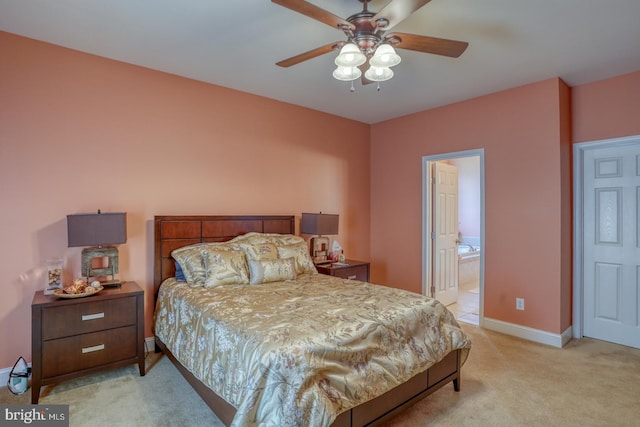 328 Gillibrook Ln, Dover, DE 19904 - bedroom with light carpet, baseboards, ceiling fan, and ensuite bath