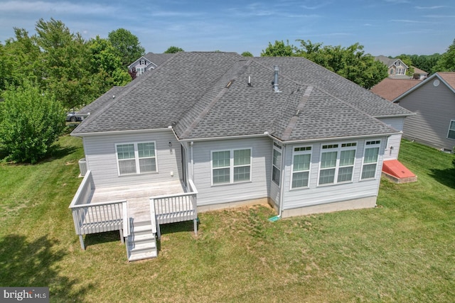 328 Gillibrook Ln, Dover, DE 19904 - back of property with roof with shingles, a wooden deck, and a lawn