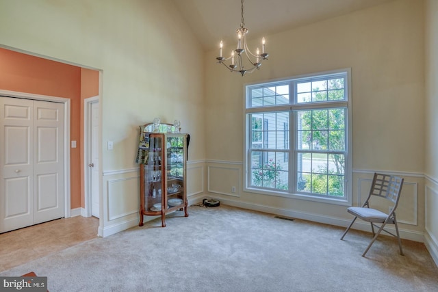 328 Gillibrook Ln, Dover, DE 19904 - sitting room with a chandelier, carpet, and high vaulted ceiling