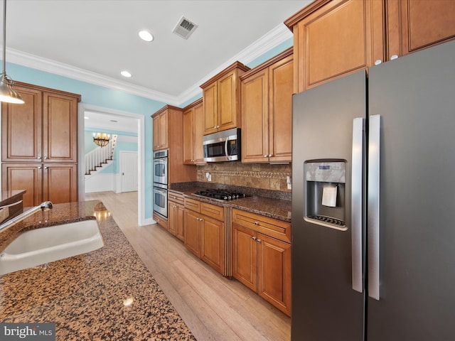 27173 Barefoot Blvd Unit 15, Millsboro, DE 19966 - kitchen with appliances with stainless steel finishes, a sink, recessed lighting, backsplash, and ornamental molding