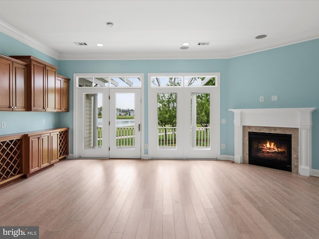 27173 Barefoot Blvd Unit 15, Millsboro, DE 19966 - unfurnished living room with a fireplace, ornamental molding, light wood-type flooring, baseboards, and recessed lighting