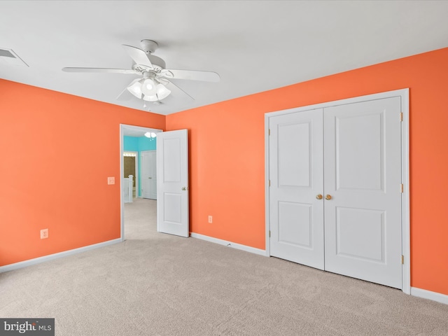 27173 Barefoot Blvd Unit 15, Millsboro, DE 19966 - unfurnished bedroom featuring carpet, baseboards, a closet, and ceiling fan