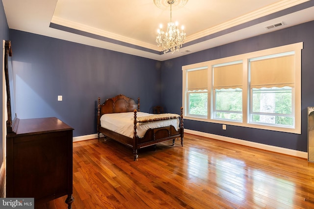 3925 Ashwood Pl, Falls Church, VA 22041 - bedroom with a raised ceiling, hardwood / wood-style flooring, a chandelier, baseboards, and crown molding