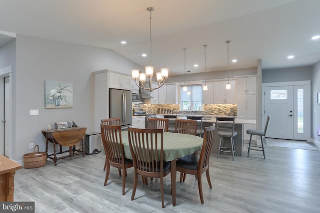 82 S Village Cir Unit 238, Palmyra, PA 17078 - dining area featuring light wood finished floors, vaulted ceiling, a chandelier, recessed lighting, and baseboards