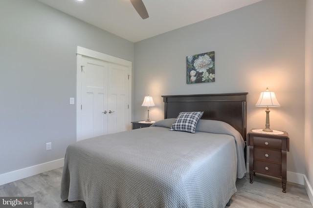 82 S Village Cir Unit 238, Palmyra, PA 17078 - bedroom with baseboards, light wood finished floors, a closet, and ceiling fan