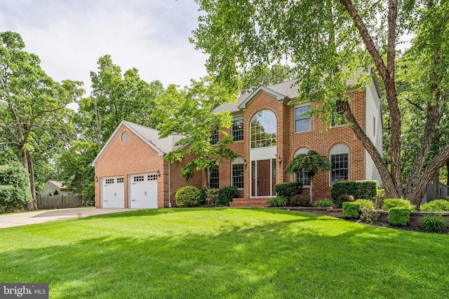 22 Devonshire Dr, Voorhees, NJ 08043 - view of front of home with brick siding, concrete driveway, an attached garage, and roof with shingles