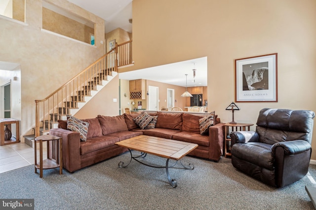 22 Devonshire Dr, Voorhees, NJ 08043 - carpeted living area with a towering ceiling, stairway, and tile patterned floors