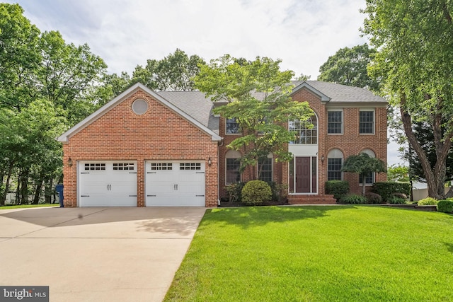 22 Devonshire Dr, Voorhees, NJ 08043 - view of front of property with brick siding, concrete driveway, an attached garage, and a front yard