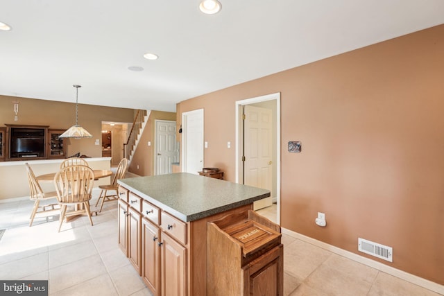 22 Devonshire Dr, Voorhees, NJ 08043 - kitchen featuring a kitchen island, light tile patterned floors, baseboards, dark countertops, and recessed lighting