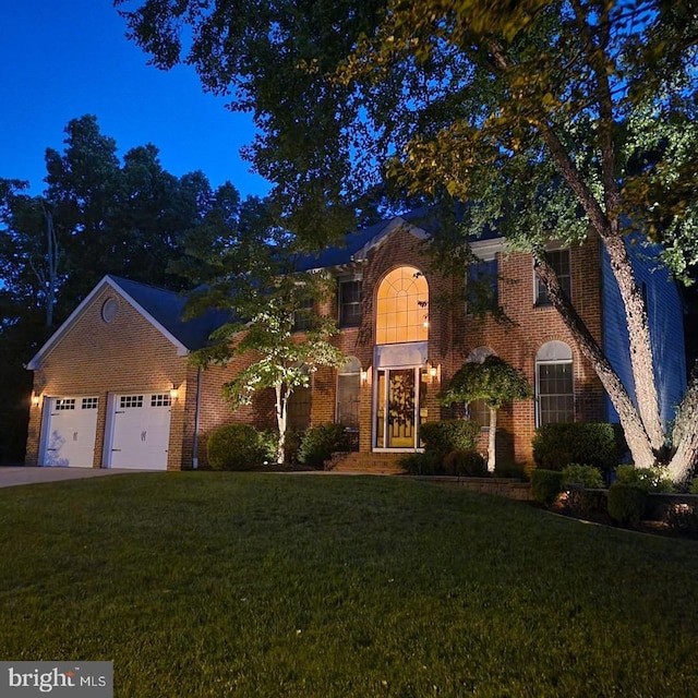 22 Devonshire Dr, Voorhees, NJ 08043 - traditional home featuring a front lawn, brick siding, concrete driveway, and a garage