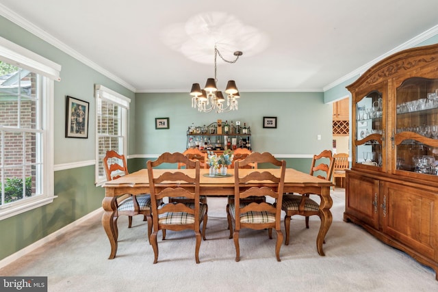 22 Devonshire Dr, Voorhees, NJ 08043 - dining room with a chandelier, ornamental molding, light colored carpet, and baseboards