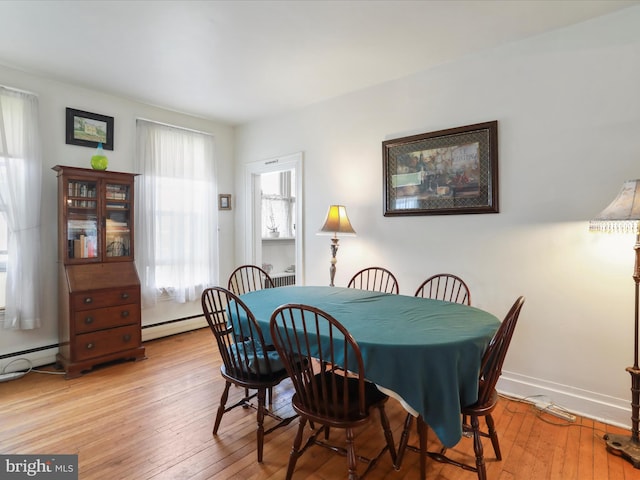 214 Center St, Edinburg, VA 22824 - dining space with light wood-style flooring and baseboards