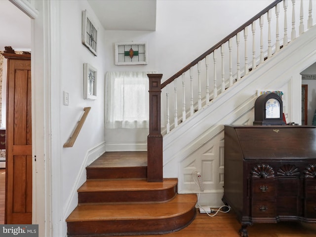 214 Center St, Edinburg, VA 22824 - stairs with wood finished floors and baseboards