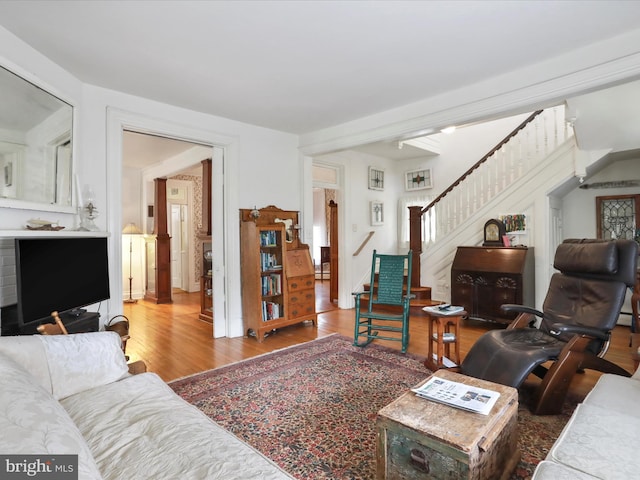 214 Center St, Edinburg, VA 22824 - living room with wood finished floors and stairway