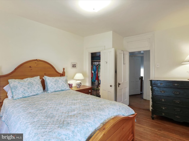 214 Center St, Edinburg, VA 22824 - bedroom with wood finished floors, a closet, and a spacious closet