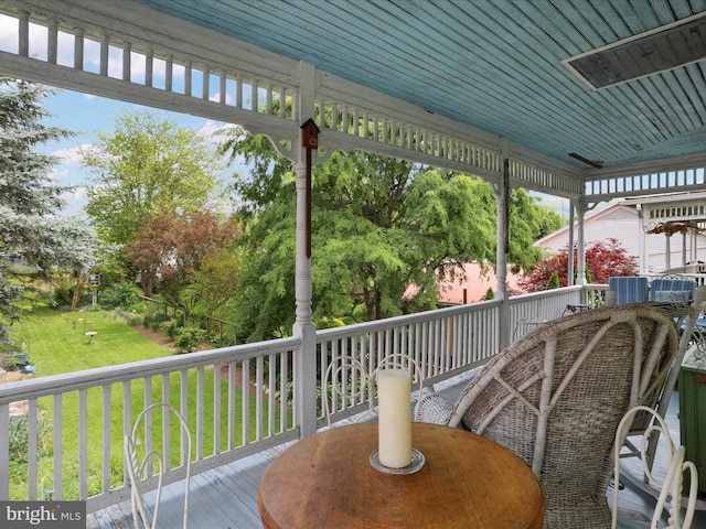 214 Center St, Edinburg, VA 22824 - deck with outdoor dining space and a lawn