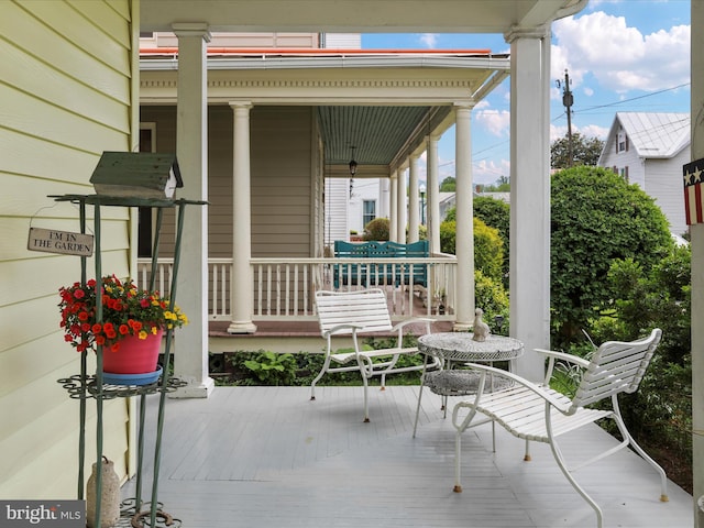 214 Center St, Edinburg, VA 22824 - wooden terrace with a porch