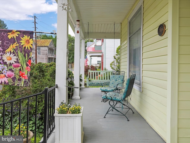214 Center St, Edinburg, VA 22824 - view of patio / terrace with a porch