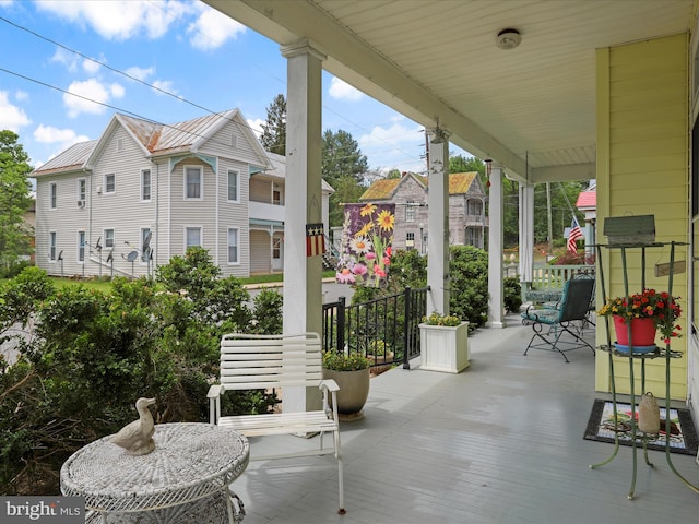 214 Center St, Edinburg, VA 22824 - view of patio / terrace featuring covered porch