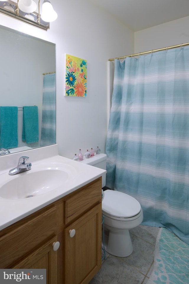 121 Washington Pl, State College, PA 16801 - full bathroom featuring tile patterned floors, vanity, and toilet