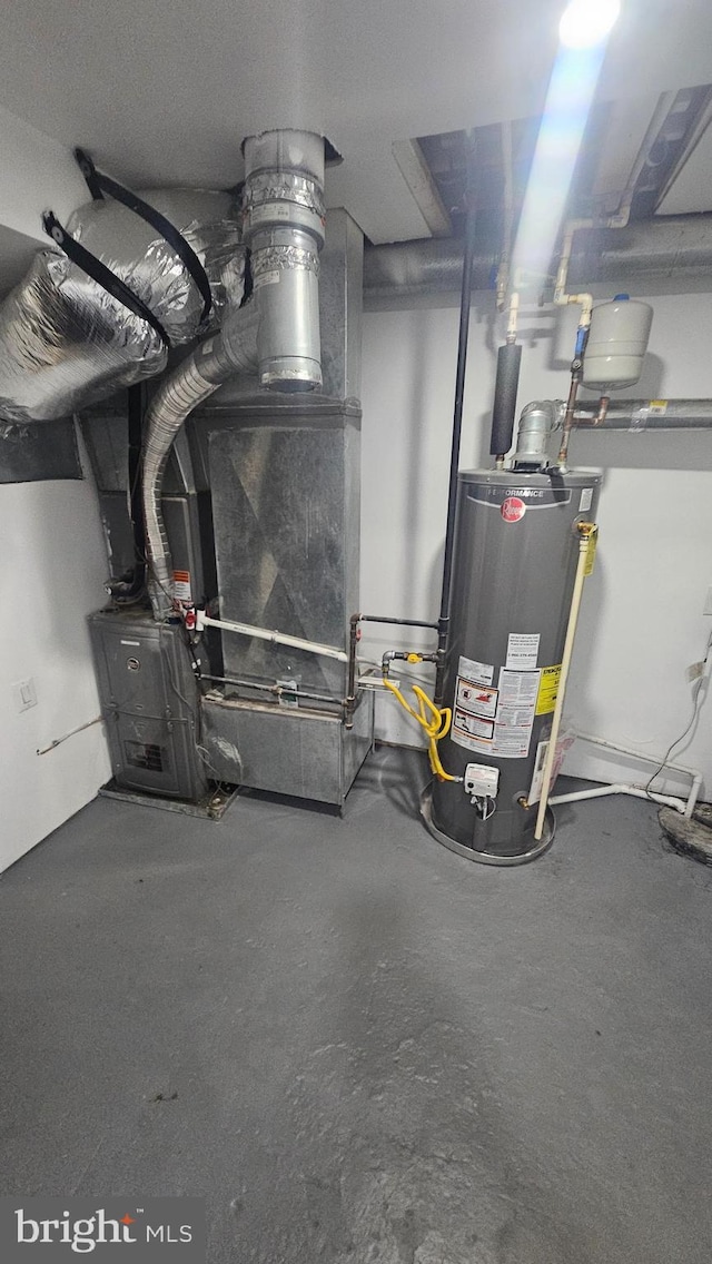 utility room with water heater