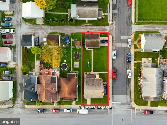 aerial perspective of suburban area with property boundaries highlighted