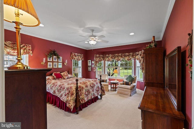 carpeted bedroom with crown molding, recessed lighting, and a ceiling fan