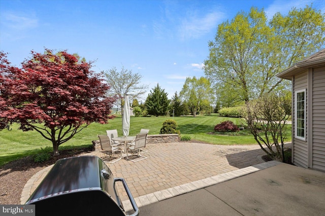 view of patio featuring outdoor dining area