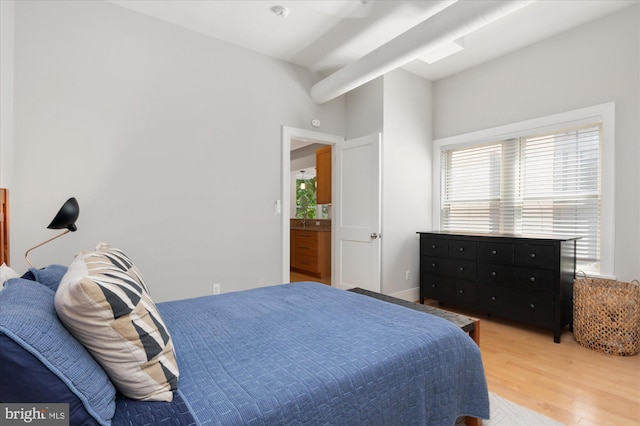 bedroom featuring light wood-style flooring and multiple windows
