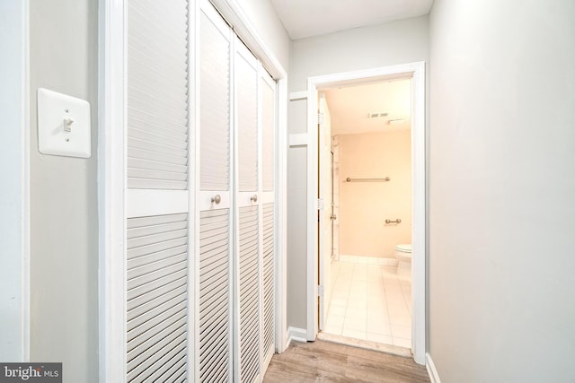 8318 Kingsgate Rd Unit 537, Springfield, VA 22152 - hallway featuring wood finished floors and baseboards