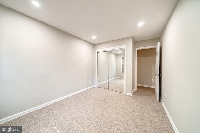 8318 Kingsgate Rd Unit 537, Springfield, VA 22152 - unfurnished bedroom featuring recessed lighting, light carpet, a closet, and baseboards