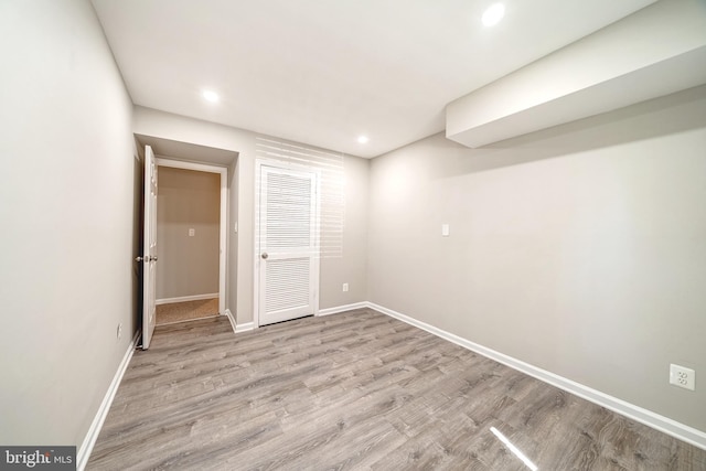 8318 Kingsgate Rd Unit 537, Springfield, VA 22152 - unfurnished bedroom with wood finished floors, baseboards, and recessed lighting