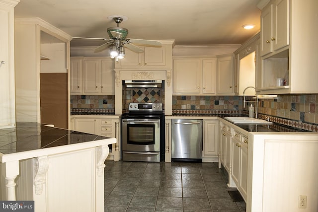 1158 Custer Dr, Auburn, PA 17922 - kitchen with appliances with stainless steel finishes, a sink, ceiling fan, decorative backsplash, and crown molding