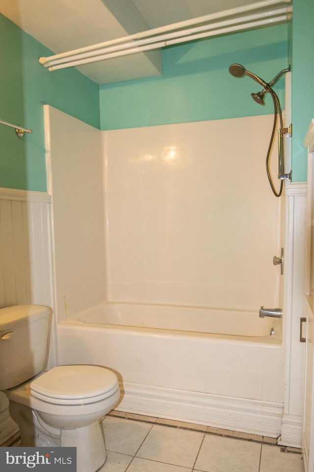 1158 Custer Dr, Auburn, PA 17922 - full bathroom with a wainscoted wall, toilet, bathing tub / shower combination, and tile patterned flooring