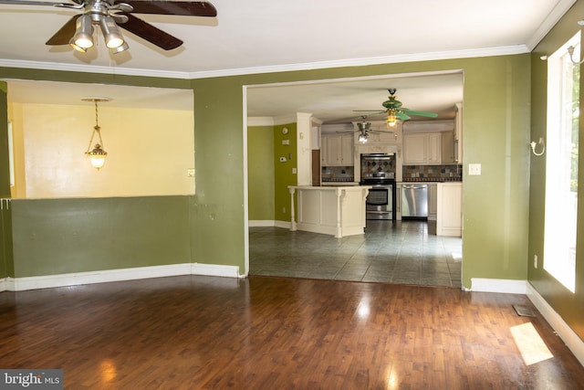 1158 Custer Dr, Auburn, PA 17922 - unfurnished living room with ceiling fan, baseboards, dark wood finished floors, and crown molding
