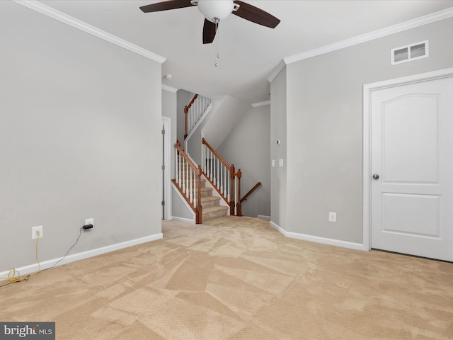 9411 Zebedee St, Manassas, VA 20110 - spare room with ornamental molding, carpet flooring, ceiling fan, baseboards, and stairs