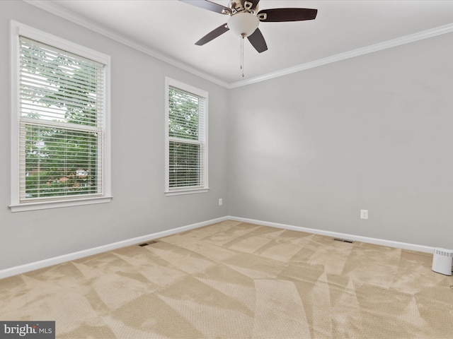 9411 Zebedee St, Manassas, VA 20110 - empty room featuring carpet floors, crown molding, baseboards, and a ceiling fan