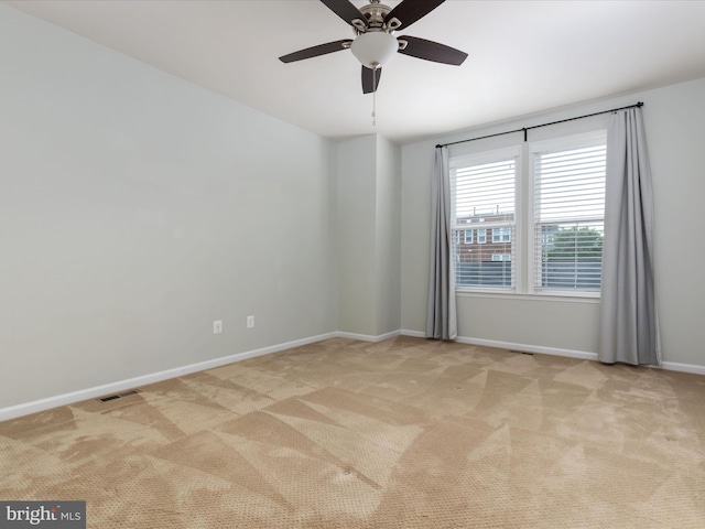 9411 Zebedee St, Manassas, VA 20110 - carpeted spare room with baseboards and a ceiling fan