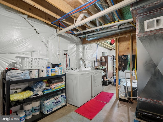 433 Tulip Poplar Dr, Linden, VA 22642 - unfinished below grade area featuring separate washer and dryer