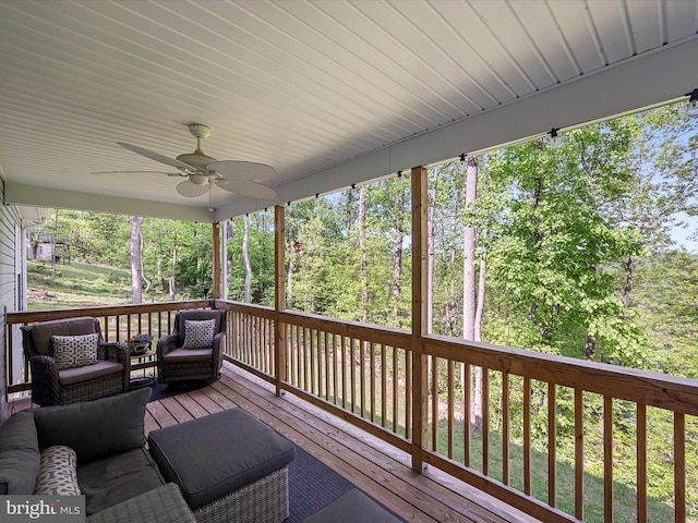 433 Tulip Poplar Dr, Linden, VA 22642 - wooden deck featuring ceiling fan, an outdoor living space, and view of scattered trees
