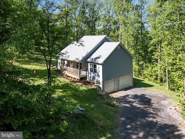 433 Tulip Poplar Dr, Linden, VA 22642 - view of home's exterior with driveway, a garage, a shingled roof, and a lawn