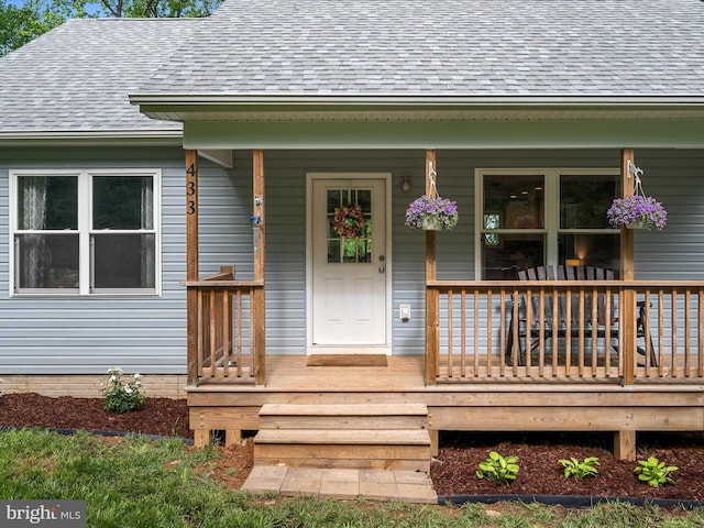 433 Tulip Poplar Dr, Linden, VA 22642 - view of exterior entry with roof with shingles and covered porch