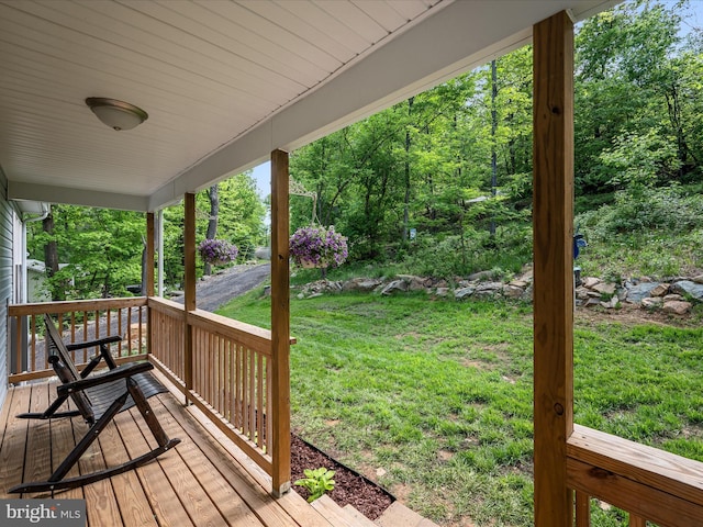 433 Tulip Poplar Dr, Linden, VA 22642 - wooden deck featuring a porch and a lawn