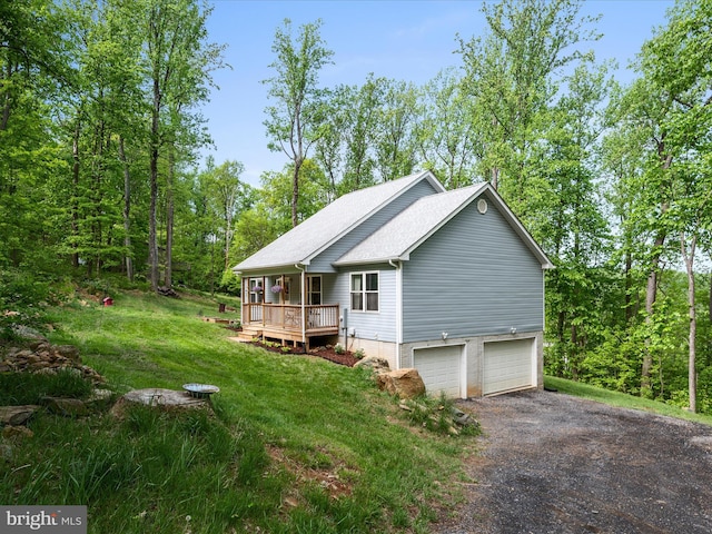 433 Tulip Poplar Dr, Linden, VA 22642 - view of side of property featuring driveway, a garage, a wooden deck, and a lawn